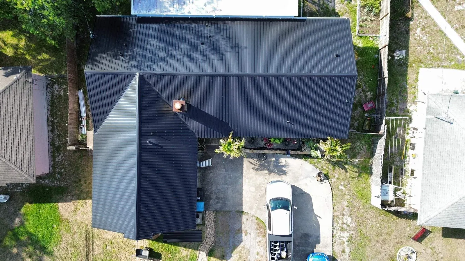 Overhead view of the black Kynar rib panel roof