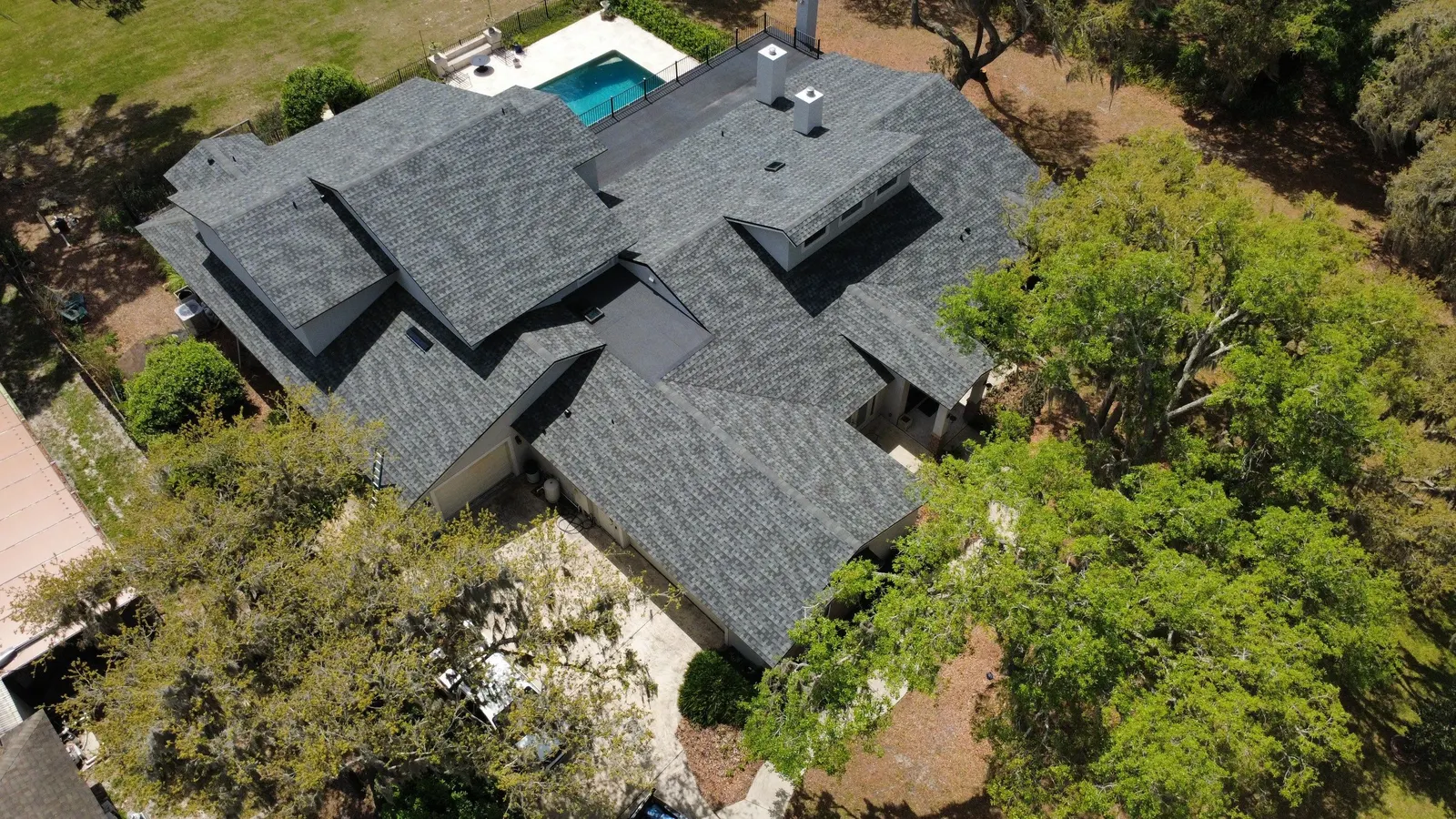 Aerial view of the Lake Mary home's new shingle roof