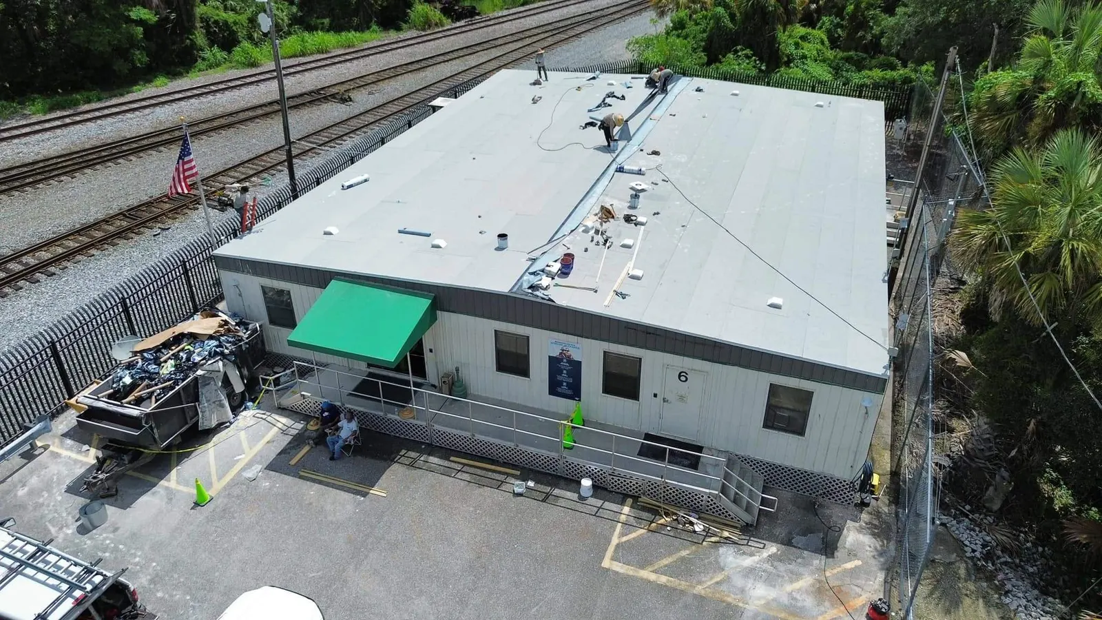 Flat modified bitumen roof on the Amtrak facility in Sanford