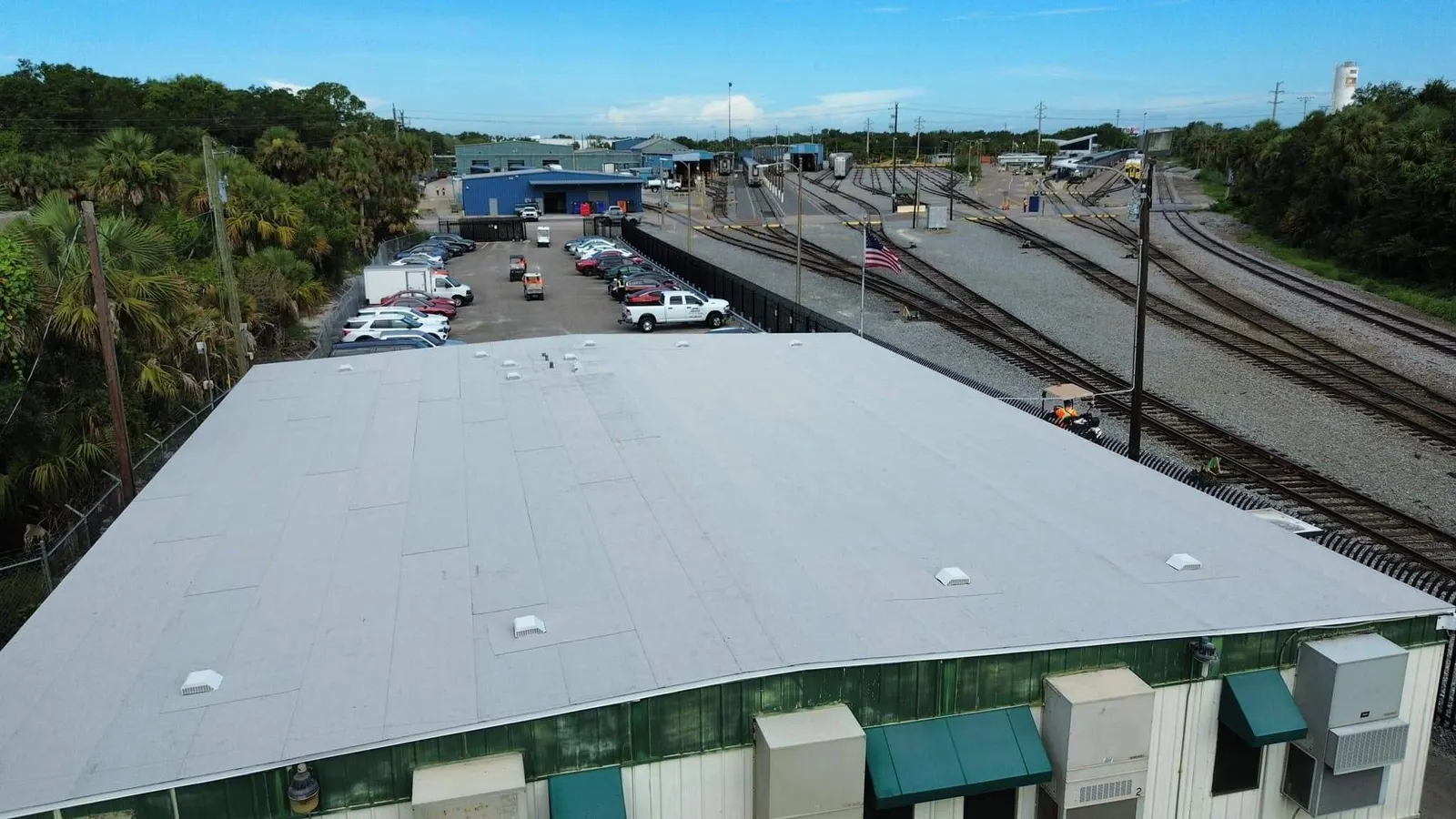 The Amtrak building's 2-ply modified bitumen roof with the Sanford rail yard behind