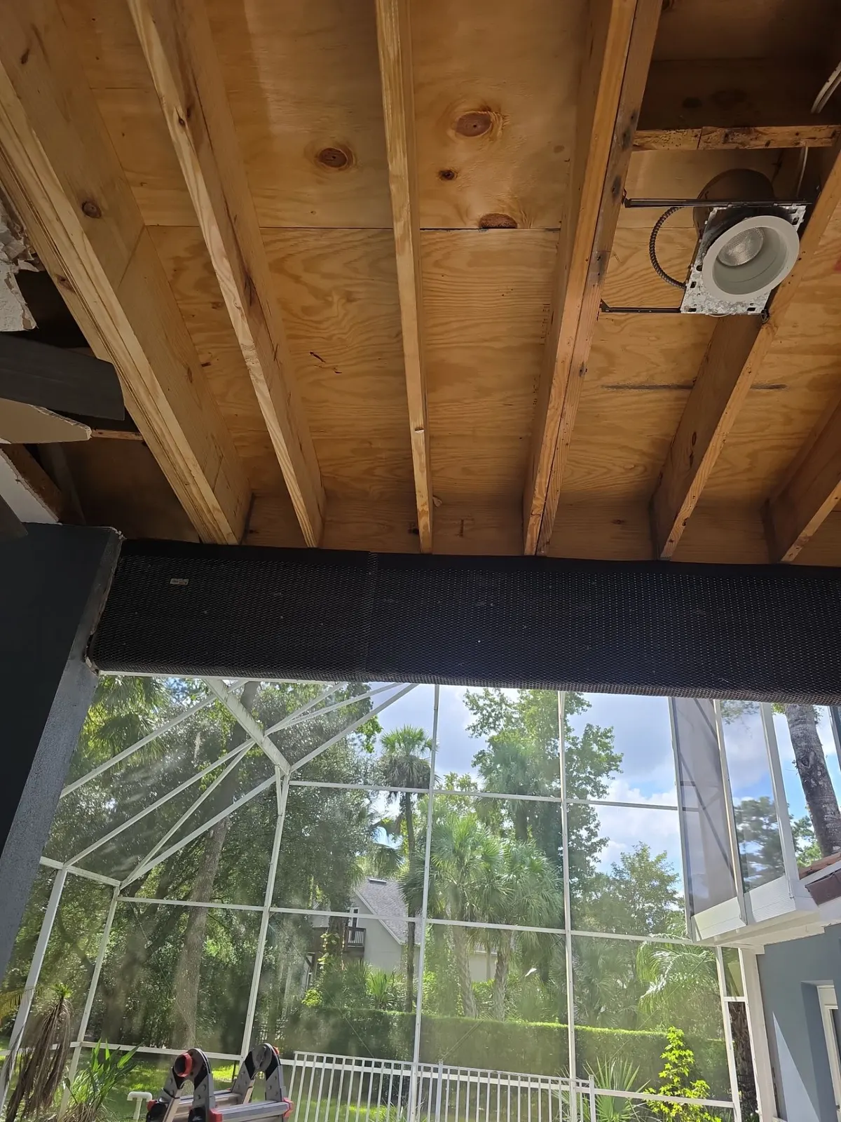New ceiling framing installed over the lanai