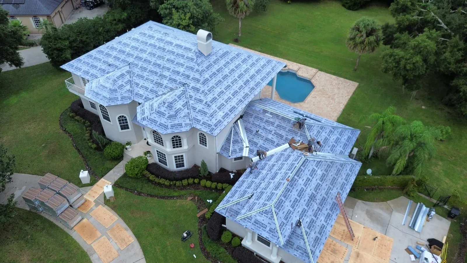 Longwood roof dried in with underlayment before the new Eagle concrete tile