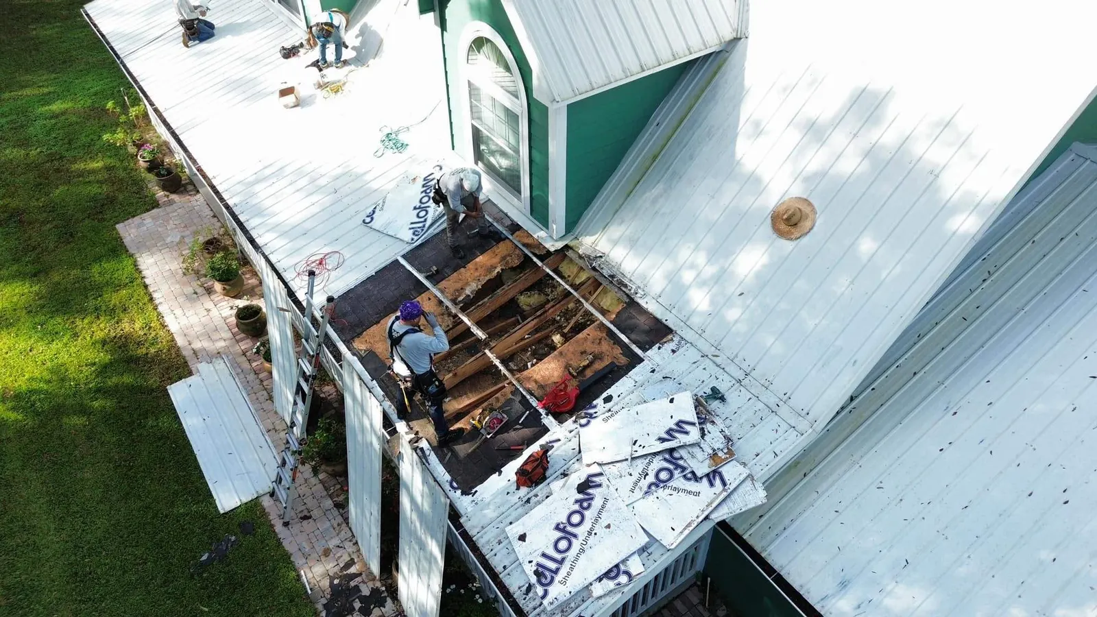 Roof deck repair on a damaged roof section