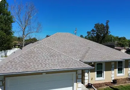 Gray shingle roof on a Florida home after inspection and repair